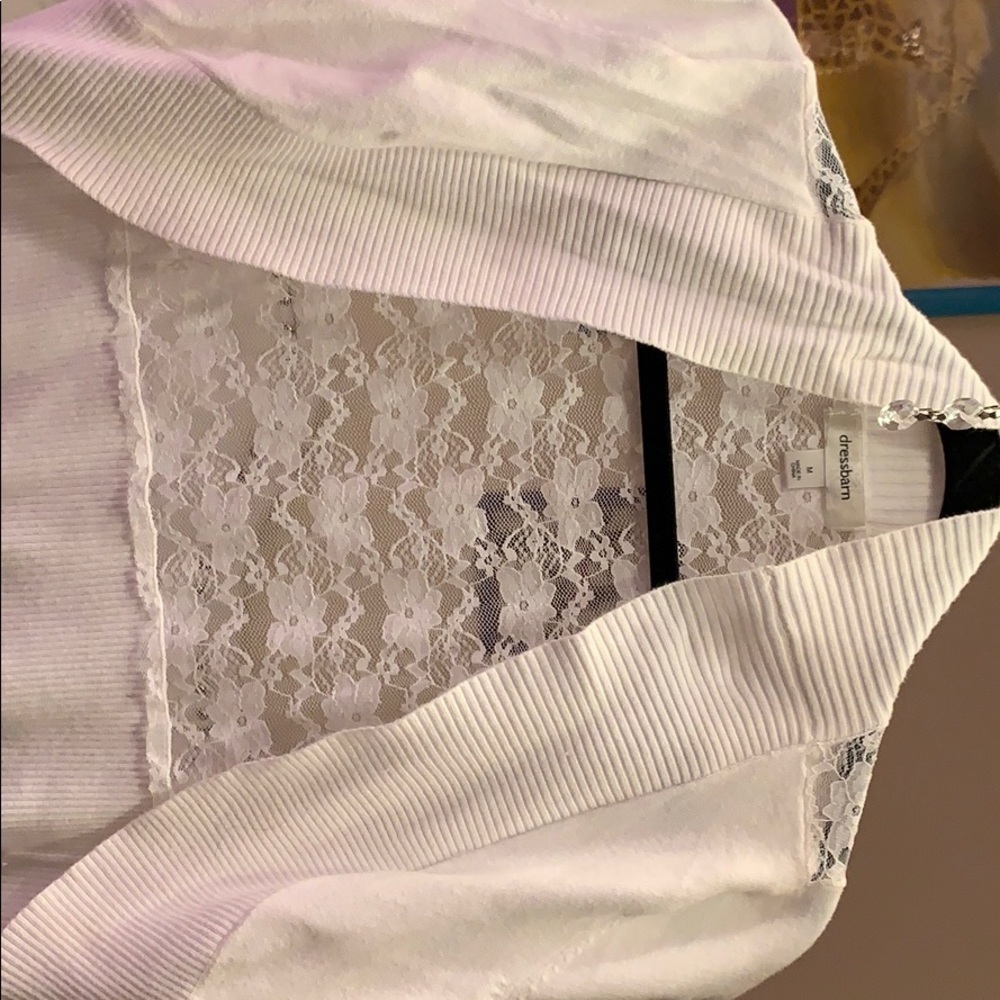 A women’s white cardigan